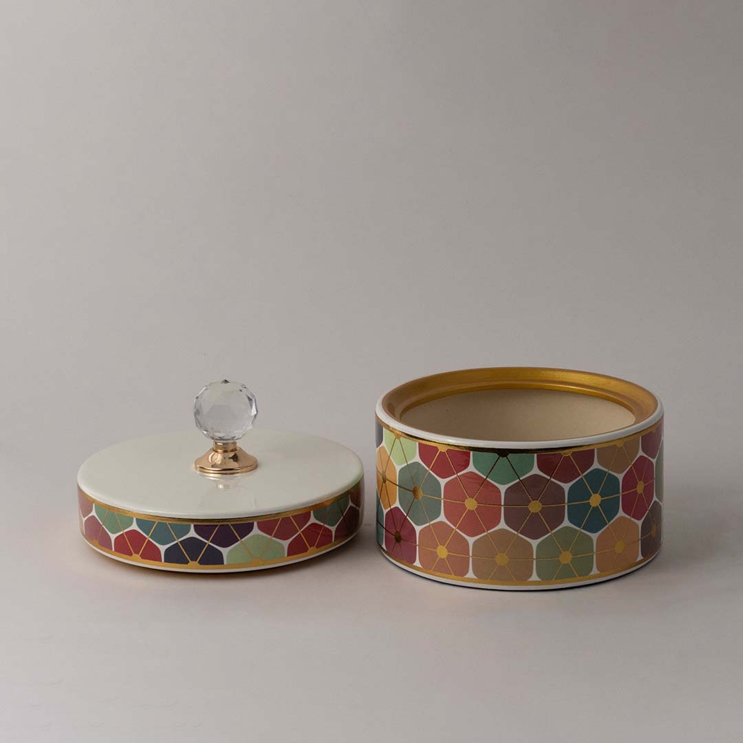 Luxury ceramic decor jar with crystal top and vibrant multicolor geometric artwork ideal for home or tabletop styling.