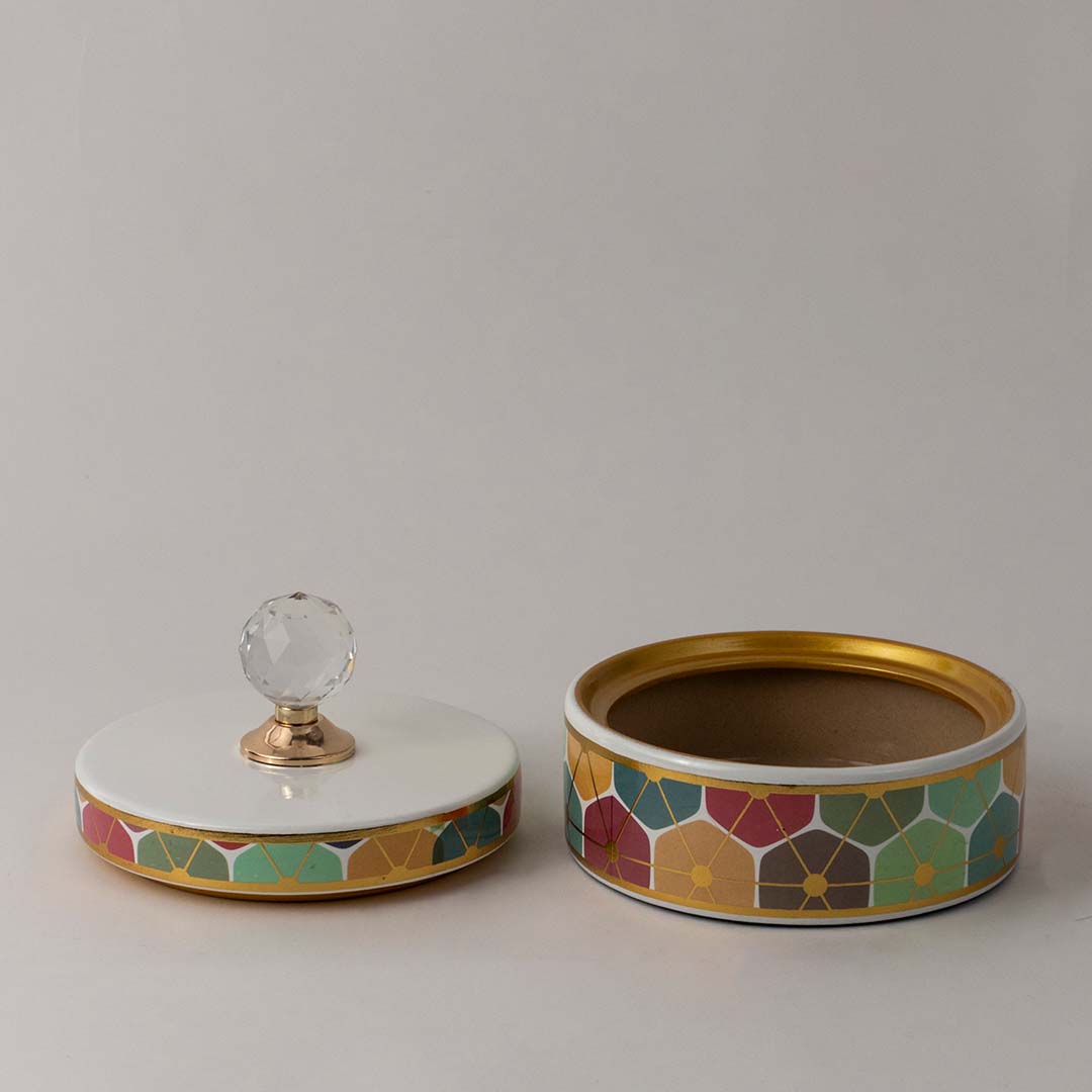 Luxury ceramic jar with artistic geometric flower design and crystal knob lid ideal for home and tabletop decor.