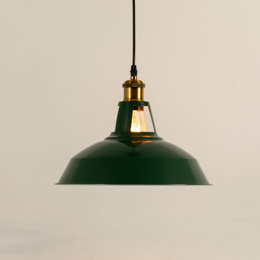 Antique metal pendant light with illuminated textured glass shade creating inviting ambient lighting for stylish interiors.