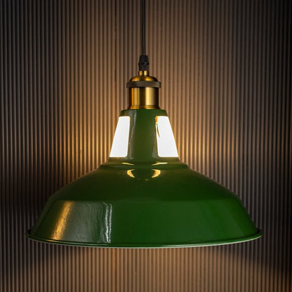 Classic green hanging pendant lamp glowing softly on black background adding warmth and charm to modern interiors.