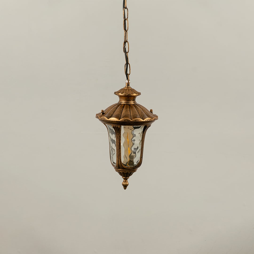 Gold metal outdoor hanging lantern light off showing textured glass and detailed metalwork ideal for enhancing patio balcony and exterior Decor styling.