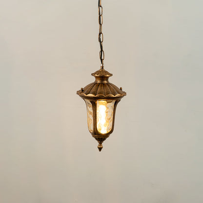 Gold metal outdoor hanging lantern light on with textured glass panels casting warm glow ideal for balcony patio pathway and entryway lighting Decor.
