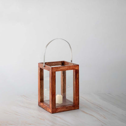 Unlit wooden lantern with clear glass panels and metallic handle on a plain white background product display view.