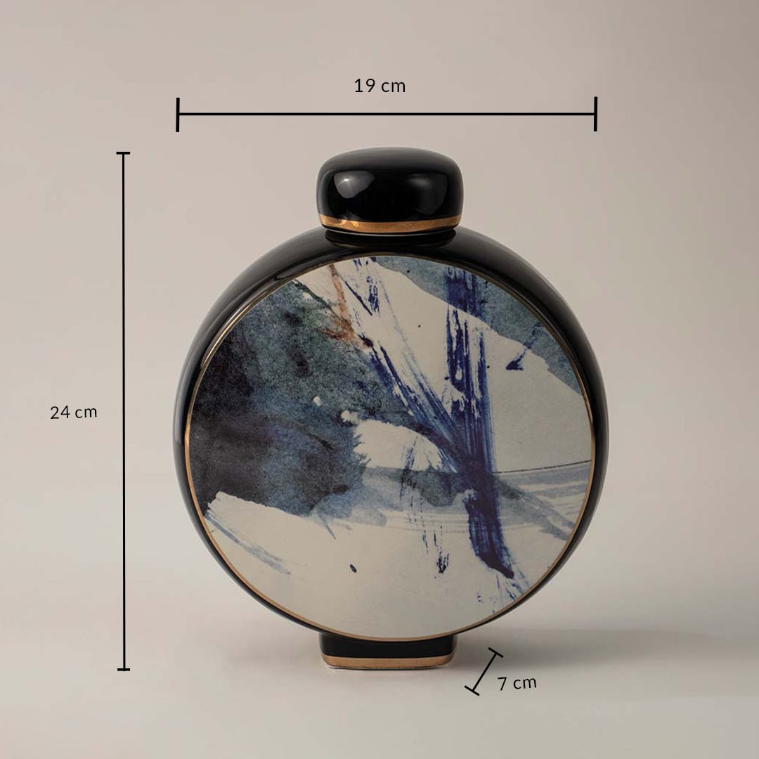 Black ceramic vase with blue abstract brush design showing 24 cm height 19 cm width and 7 cm depth on white background.