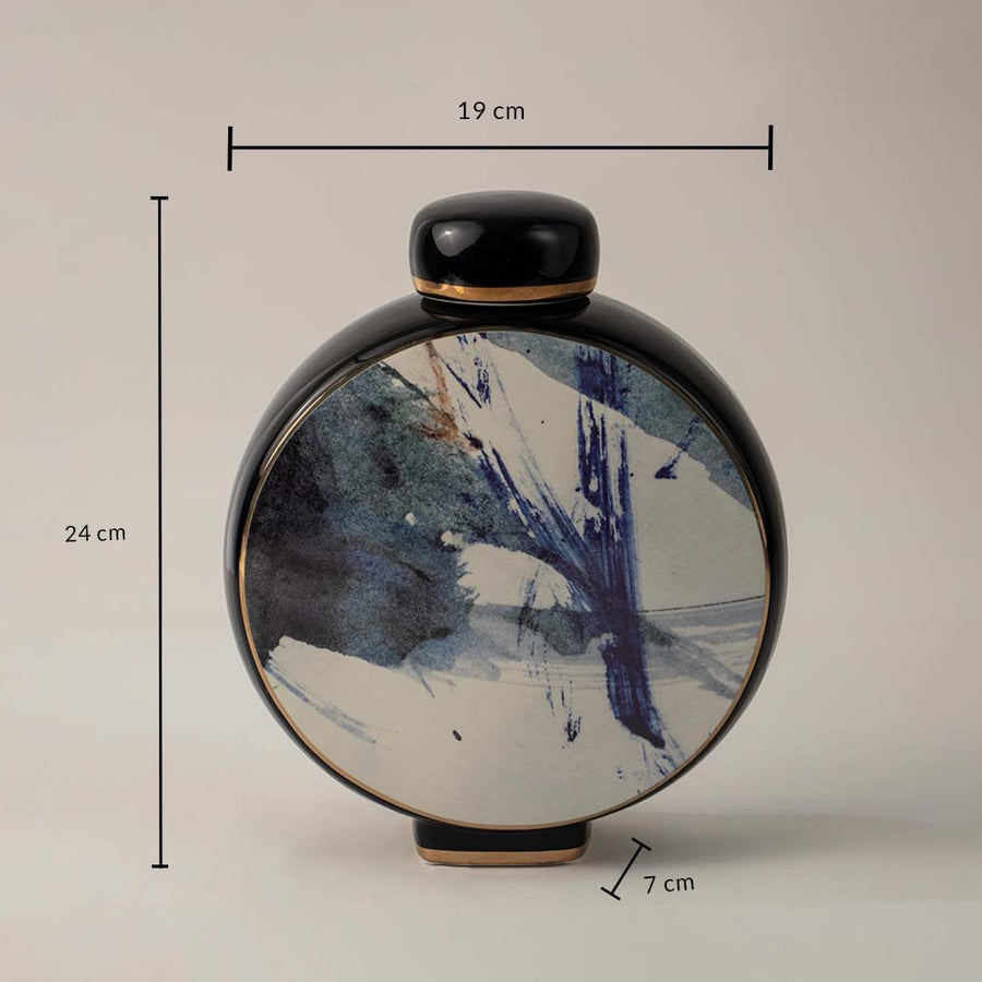 Black ceramic vase with blue abstract brush design showing 24 cm height 19 cm width and 7 cm depth on white background.