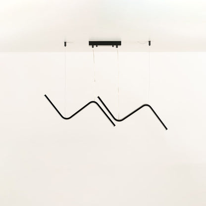 Black wave LED chandelier with sculptural flowing design ideal for large living rooms and modern interiors offering a bold artistic ceiling light statement.