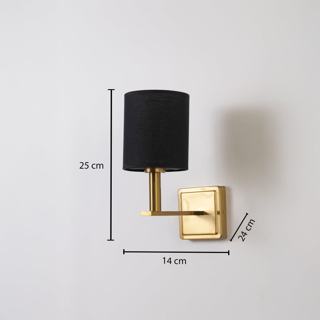 Gold wall sconce with black drum shade shown with 25 cm height 14 cm width and 24 cm depth for accurate sizing.