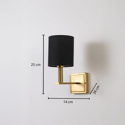 Gold wall sconce with black drum shade shown with 25 cm height 14 cm width and 24 cm depth for accurate sizing.