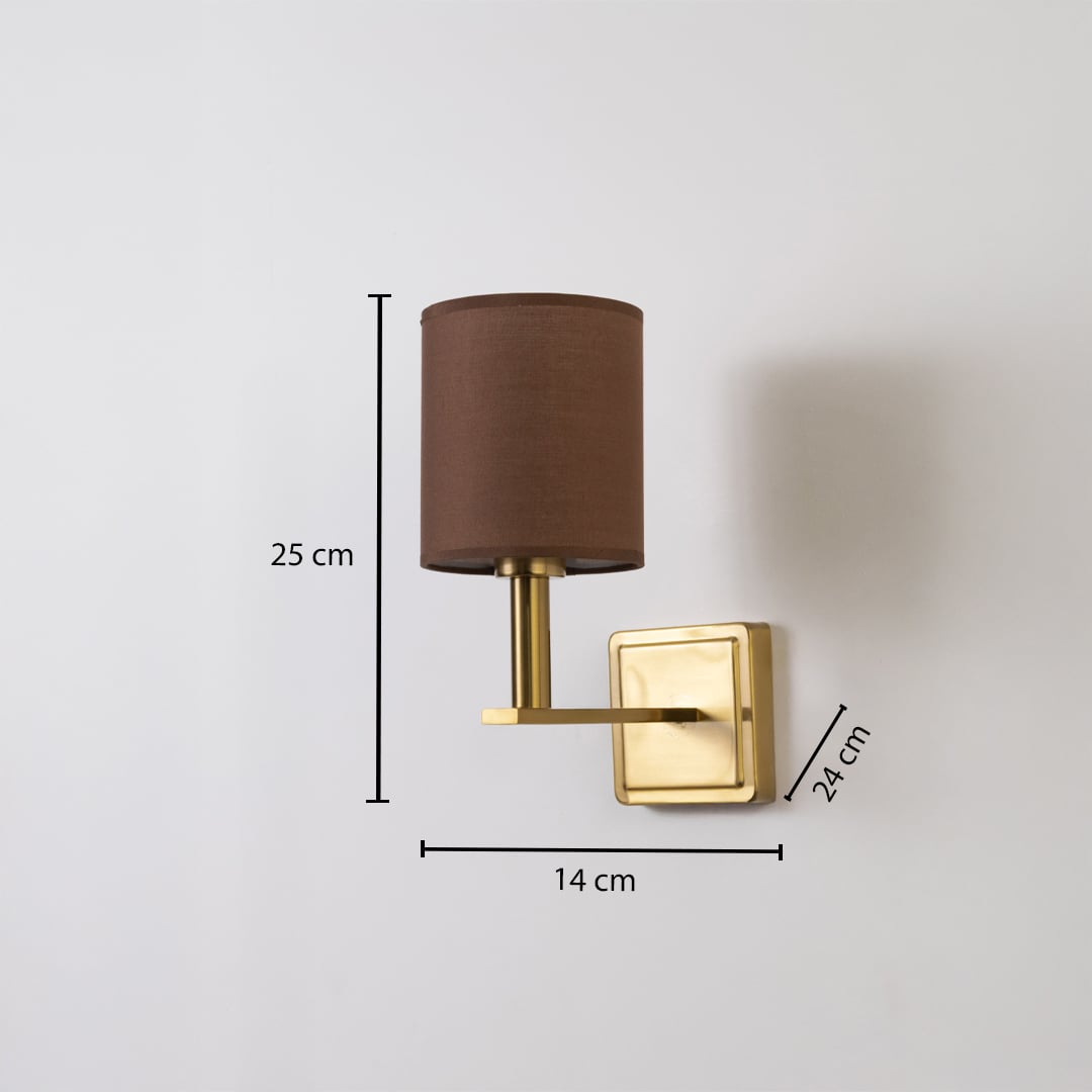 Gold wall sconce with brown drum shade shown with 25 cm height 14 cm width and 24 cm depth for accurate sizing.