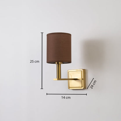 Gold wall sconce with brown drum shade shown with 25 cm height 14 cm width and 24 cm depth for accurate sizing.