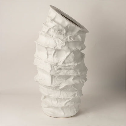 Side view of Eclipse ceramic vase revealing its uneven handcrafted layers and organic tall profile ideal for luxury decor styling.