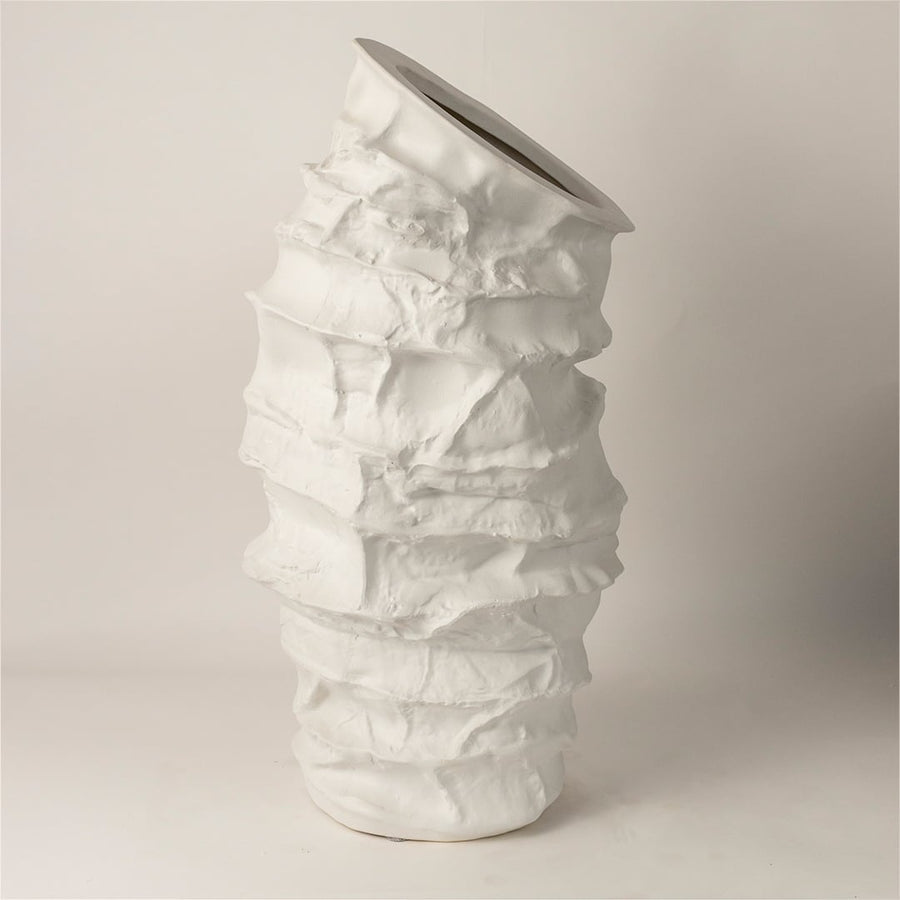Side view of Eclipse ceramic vase revealing its uneven handcrafted layers and organic tall profile ideal for luxury decor styling.