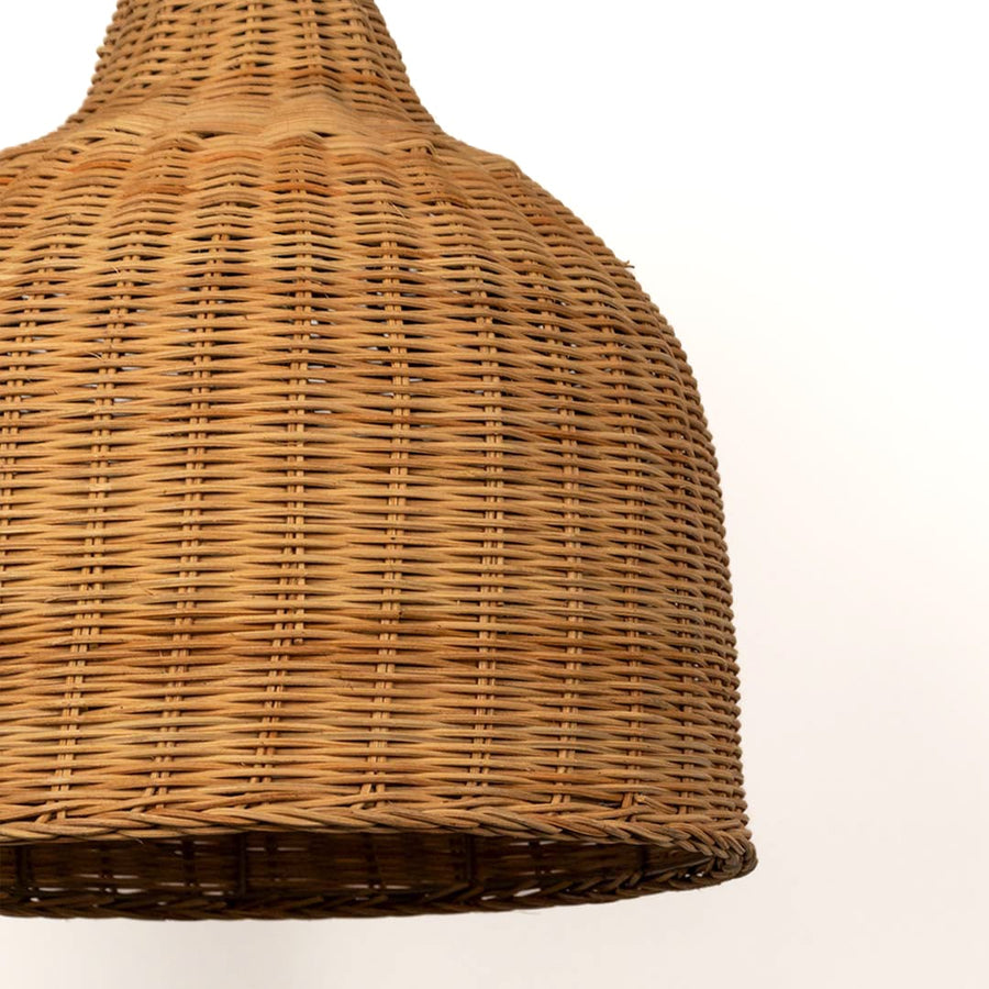 Closeup of woven brown rattan pendant light showcasing natural texture and handcrafted artisan details.
