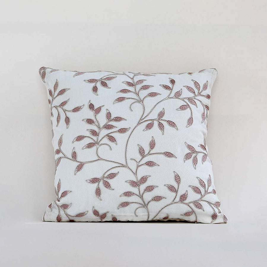 White cotton cushion cover with brown botanical leaf print for sofa bedroom seating and elegant home decor styling.
