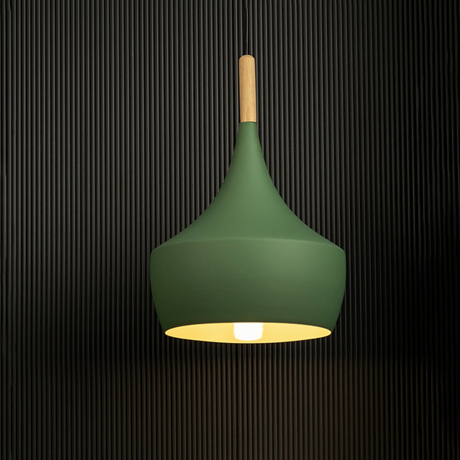 Modern pendant light in green with wood accent displayed on black background for stylish decor.
