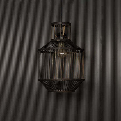 Industrial wire pendant light on dark background emphasizing its matte metal finish and modern craftsmanship.