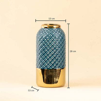 A blue textured vase with gold base displayed on a white background showing clear dimensions of height 28 cm top width 13 cm and bottom width 13 cm.