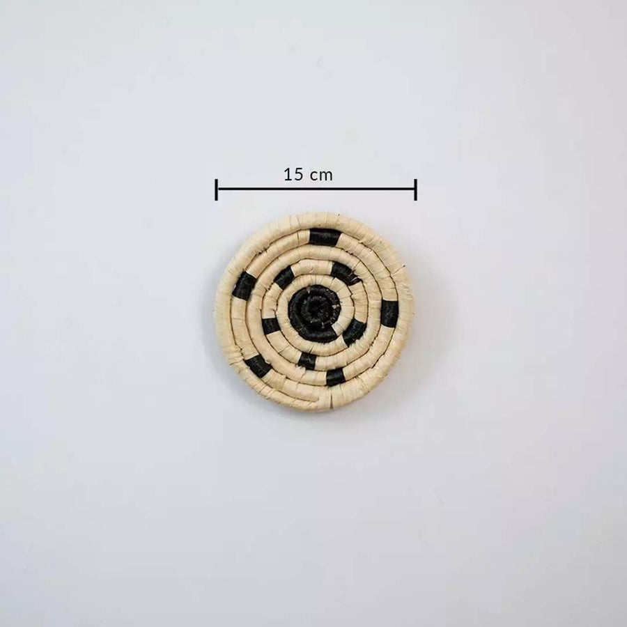 Small circular woven wall basket in natural and black tones showing 15 cm diameter ideal for compact wall decor styling.