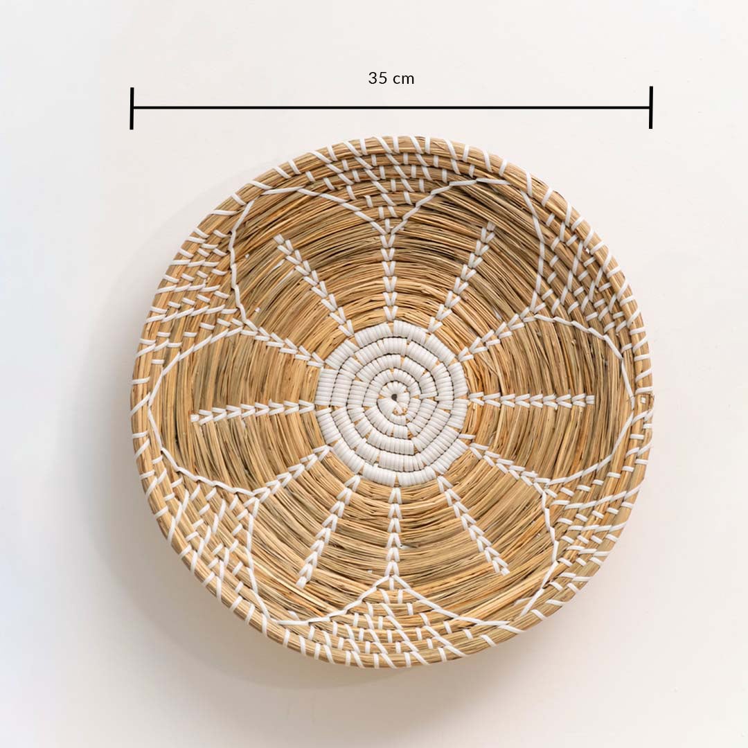 35 cm round handwoven wall basket with white tribal design made of natural jute material shown with size dimensions.
