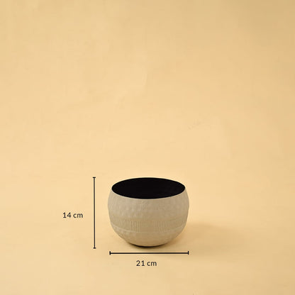 Cream round textured pot with black interior shown with 21 cm width and 14 cm height for modern decorative home styling.