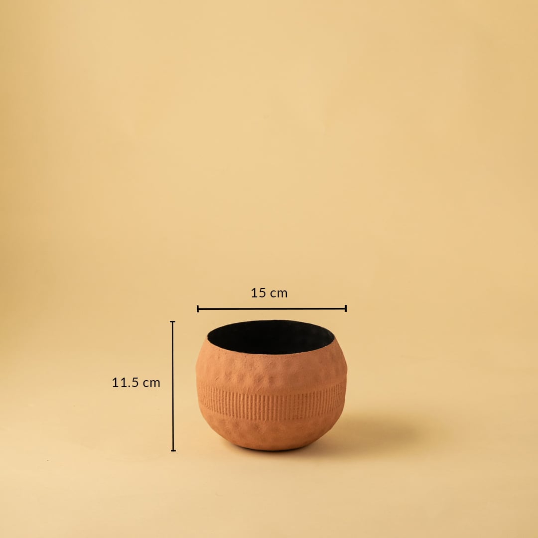 Terracotta textured planter bowl measuring 15 cm wide and 11.5 cm high with black interior shown on a clean beige background.
