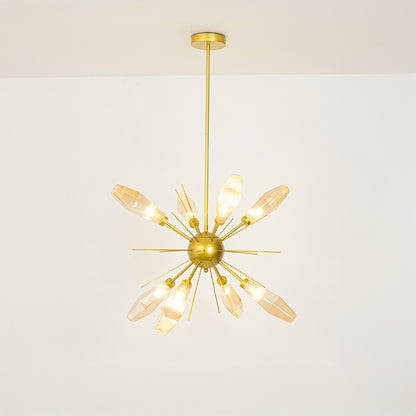 Gold metal starburst chandelier with illuminated crystal accents offering sophisticated contemporary ceiling lighting indoors.