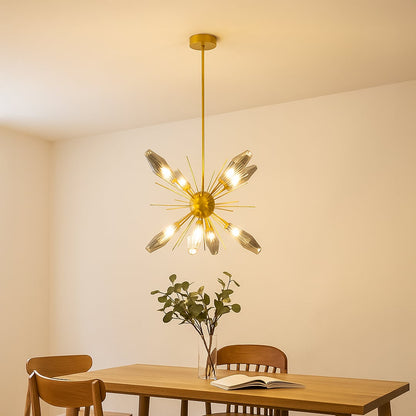 Modern gold chandelier with crystal glass rods styled in a luxurious living room adding elegance and ambient glow to interiors.