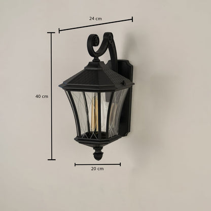 A black outdoor lantern shown on a white background with dimensions clearly marked including total height 40 cm lantern width 20 cm and wall extension 24 cm for accurate fitting.