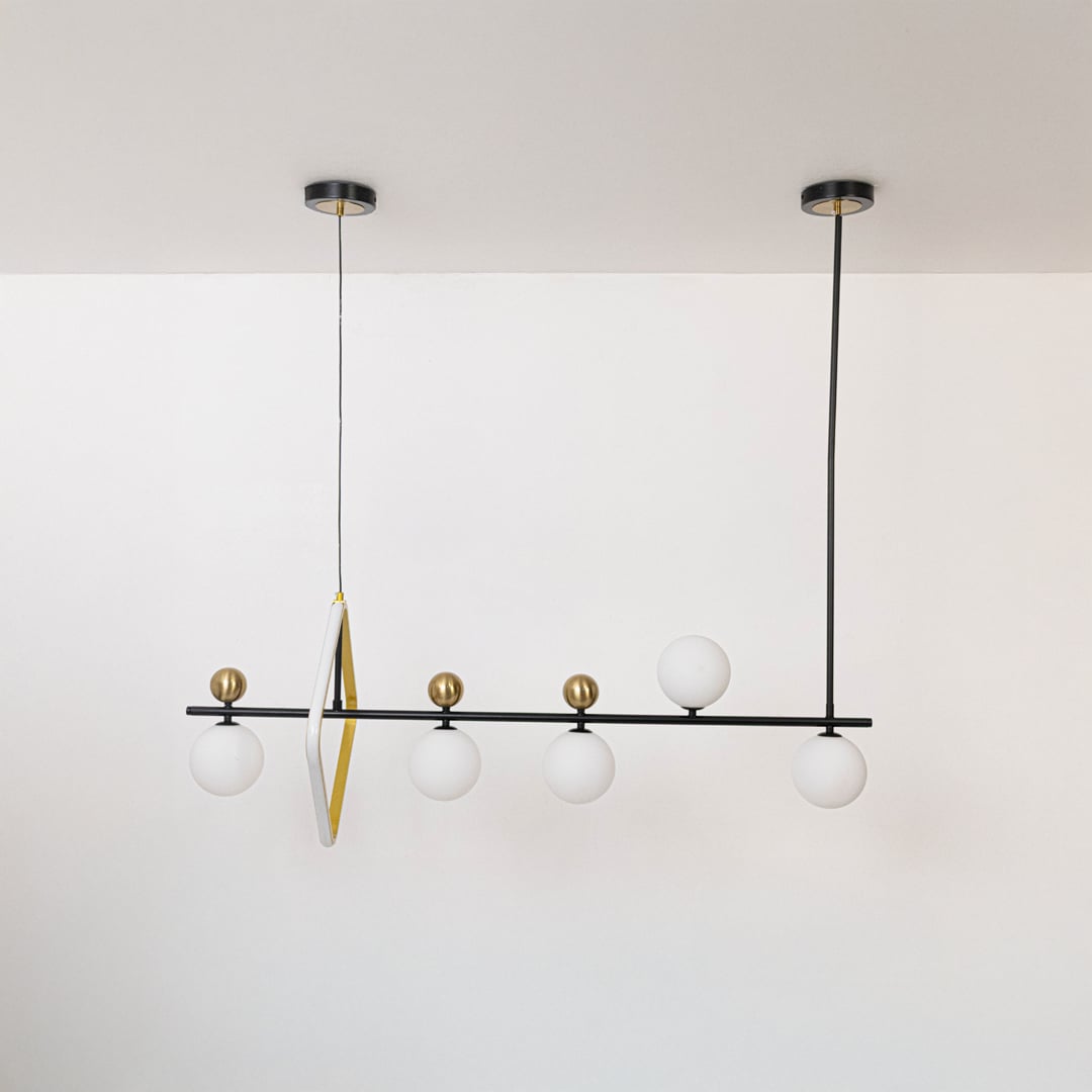 Modern black metal linear pendant light switched off on white background highlighting clean lines and elegant structure.