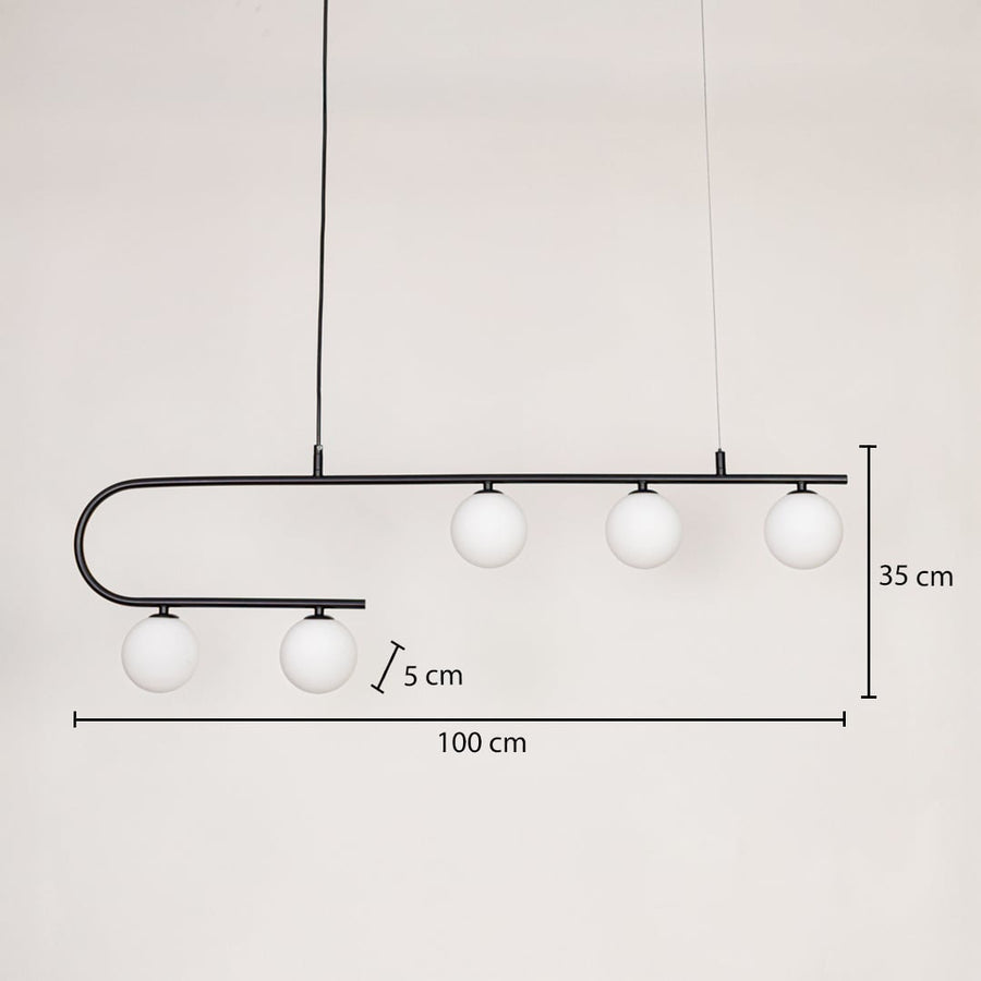Black metal linear pendant light with white glass globes measuring 100 cm length and 35 cm height designed for ceiling hanging.