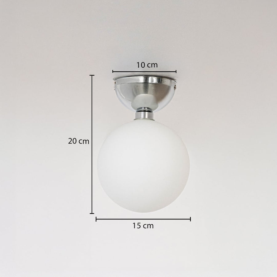 Ceiling light with chrome base and frosted glass globe shown with size dimensions 20 cm height 15 cm width and 10 cm base.