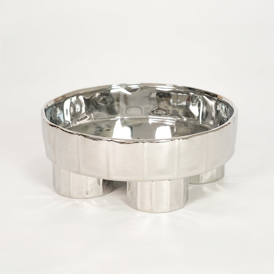 White background image of silver metal decorative bowl for modern tabletop decor styling with polished finish.