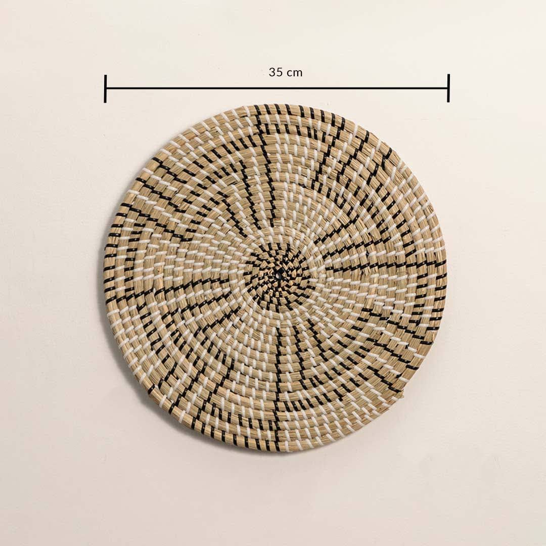 Dimension image of handcrafted black natural seagrass wall basket with geometric stepped maze pattern for boho wall decor.
