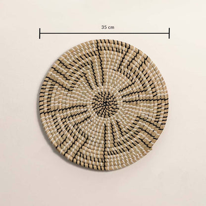 Dimension image of handcrafted black natural seagrass wall basket with geometric stepped maze pattern for boho wall decor.