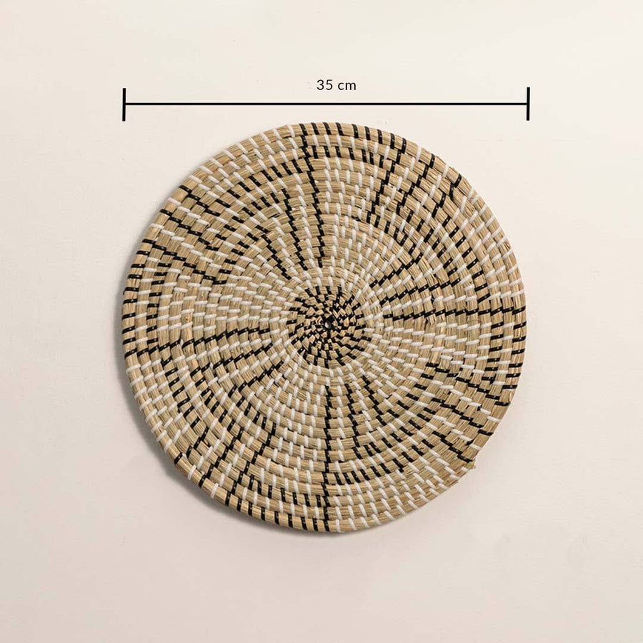 Dimension image of handcrafted black natural seagrass wall basket with geometric stepped maze pattern for boho wall decor.