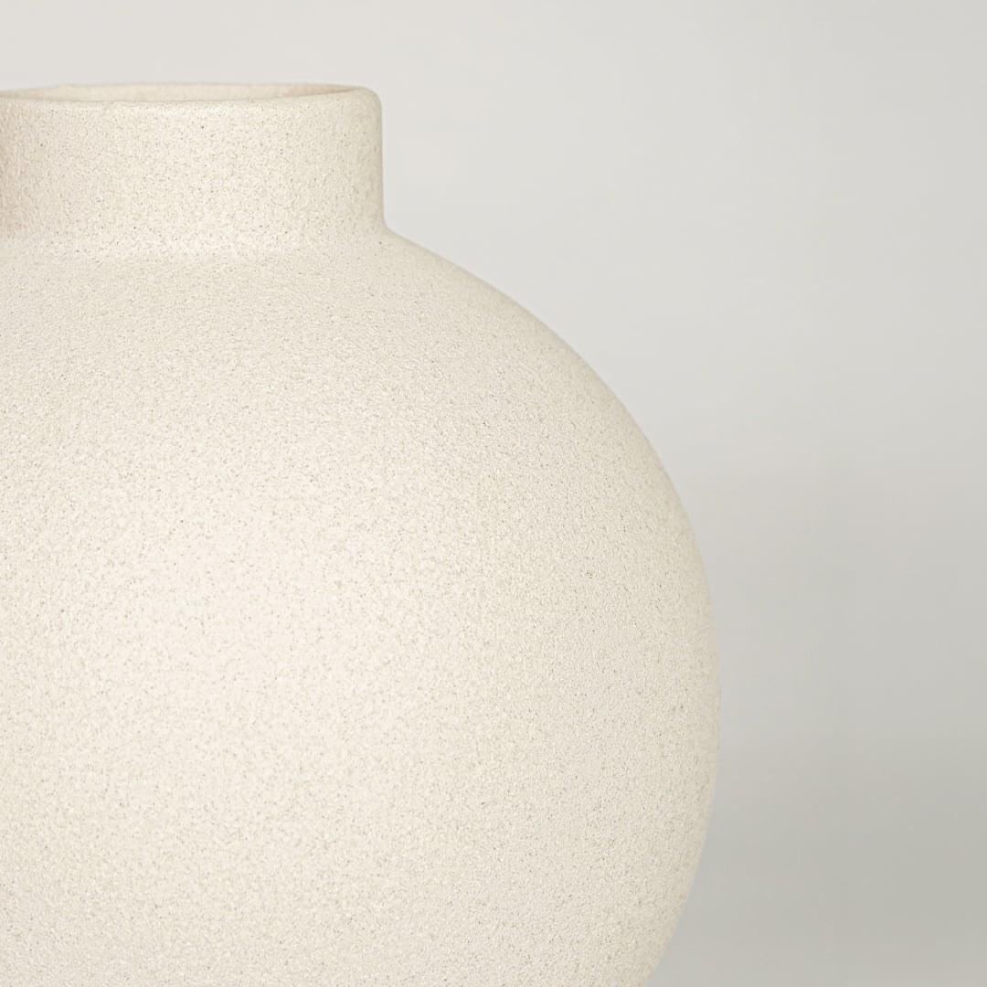 Contemporary white ceramic flower vase with spherical shape perfect for entryway table living room or dining decor display.