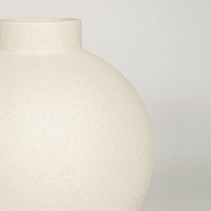 Contemporary white ceramic flower vase with spherical shape perfect for entryway table living room or dining decor display.