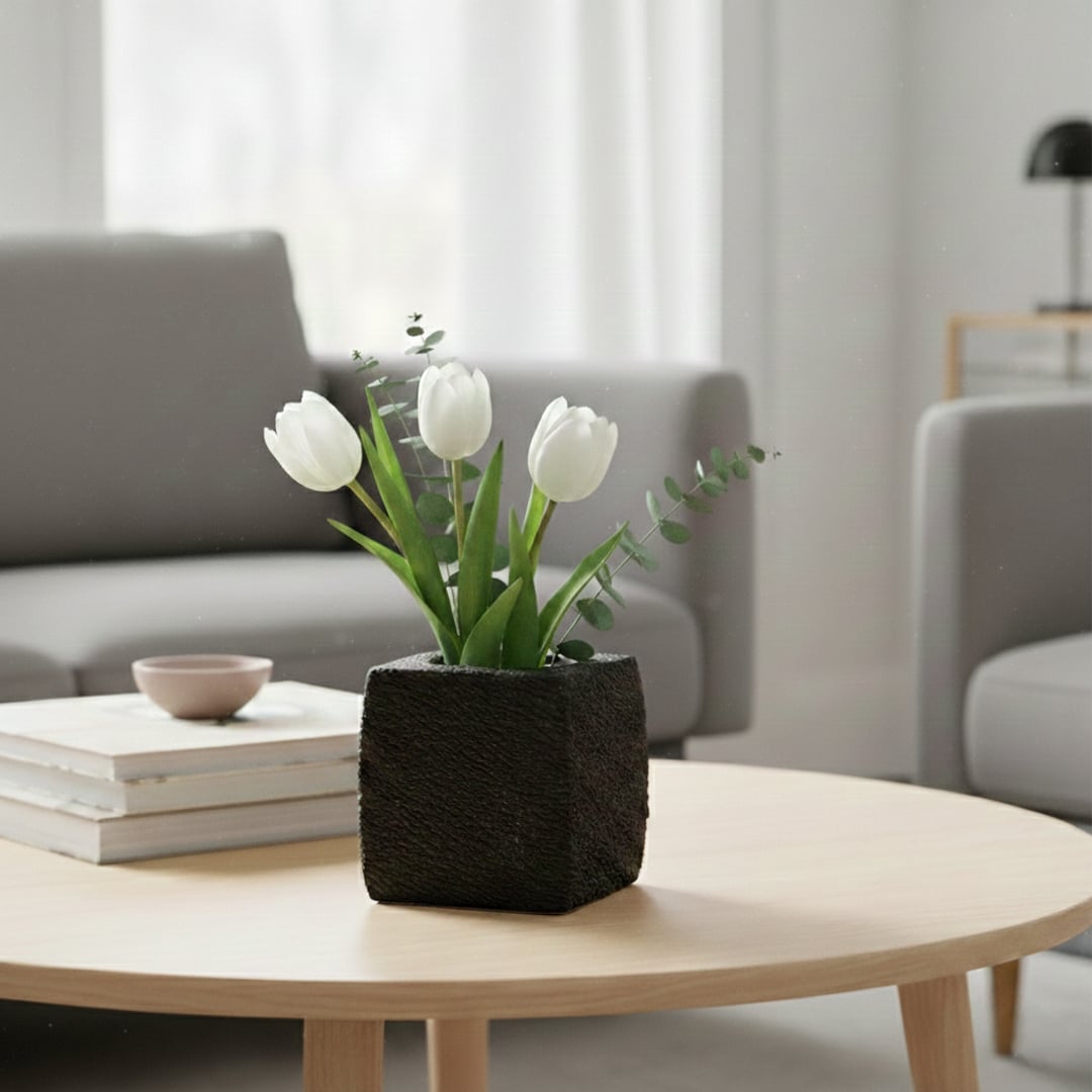 Dark grey textured ceramic planter styled on living room floor modern decorative ceramic accent for console corner styling home.