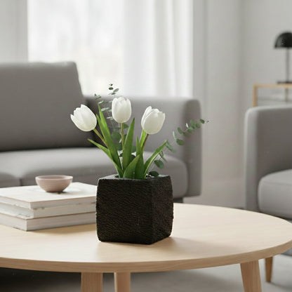 Dark grey textured ceramic planter styled on living room floor modern decorative ceramic accent for console corner styling home.