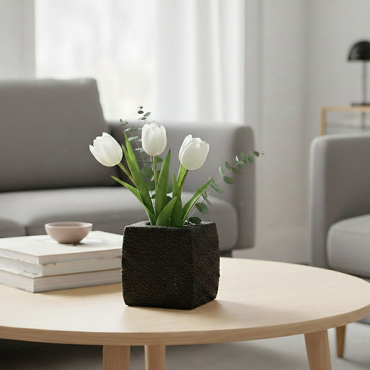 Dark grey textured ceramic planter styled on living room floor modern decorative ceramic accent for console corner styling home.
