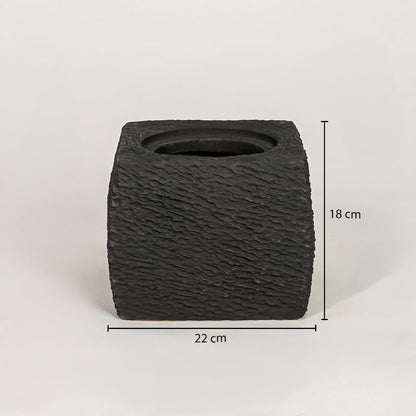 Black ceramic planter measuring 18 cm height and 22 cm width for modern tabletop decor styling placement.