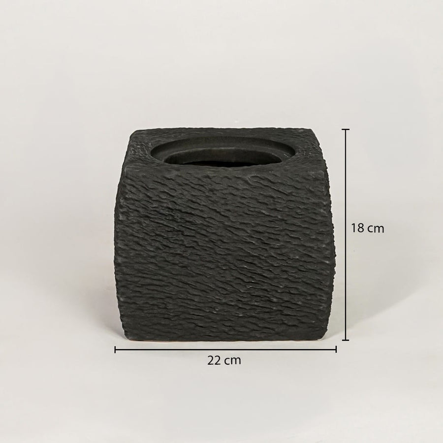 Black ceramic planter measuring 18 cm height and 22 cm width for modern tabletop decor styling placement.