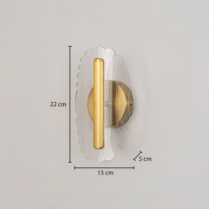 Gold metal wall light with clear acrylic decorative shade shown with 22 cm height and 15 cm width for clear sizing.
