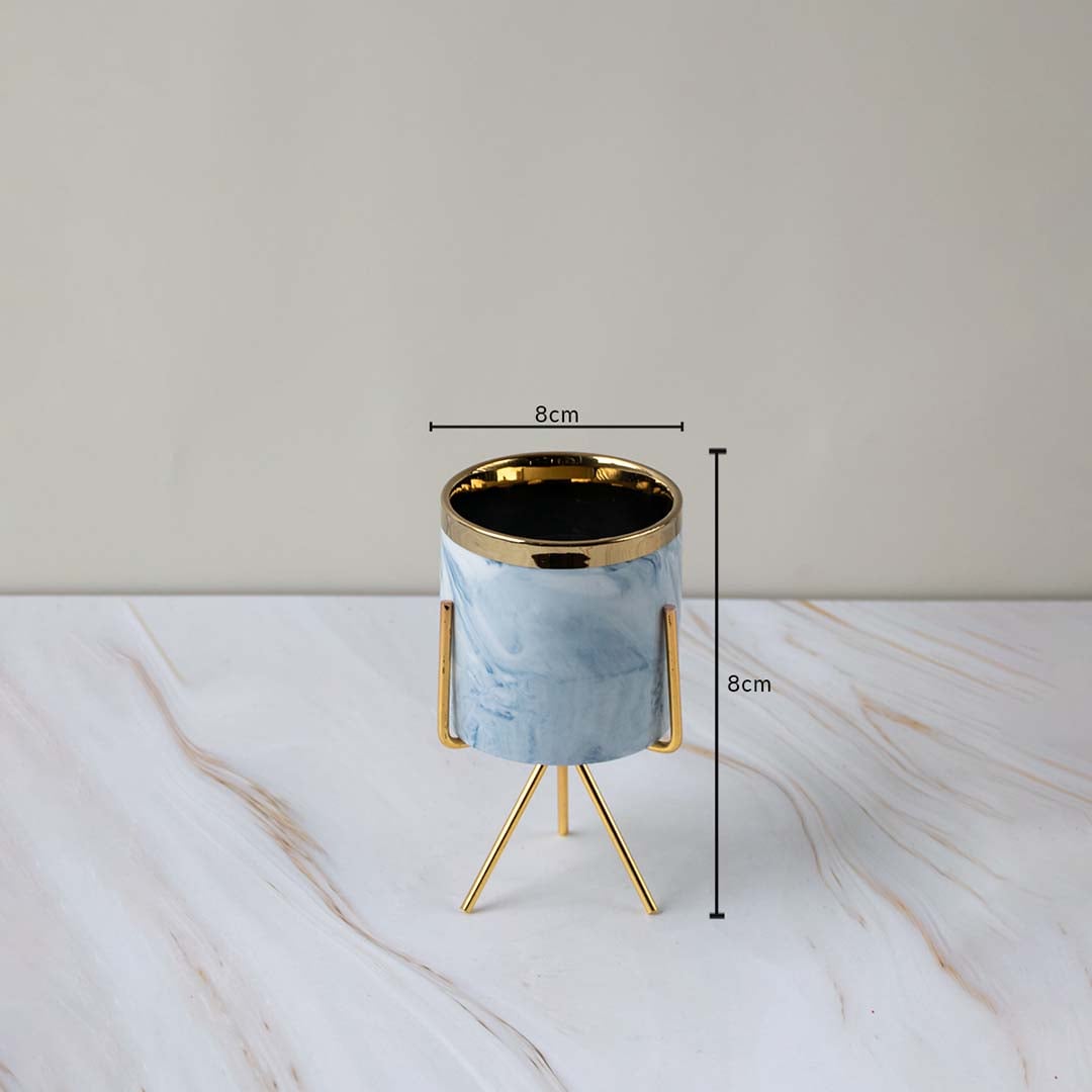 A decorative marble planter with gold stand shown with precise dimensions highlighting 8 cm width and 8 cm height for better size clarity.