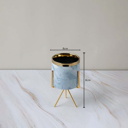 A decorative marble planter with gold stand shown with precise dimensions highlighting 8 cm width and 8 cm height for better size clarity.