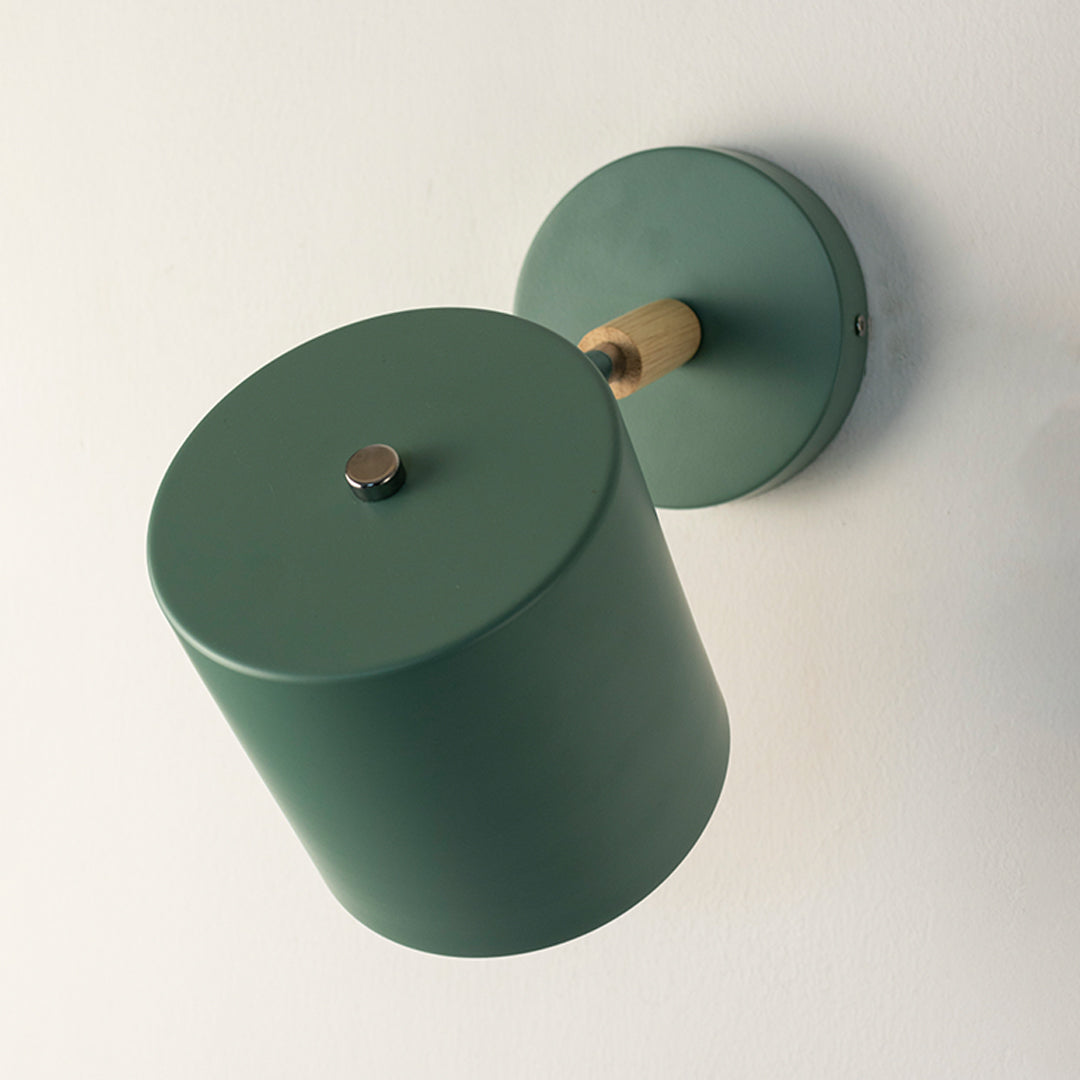 Contemporary green metal spotlight wall light with matte finish for elegant modern interior decor.