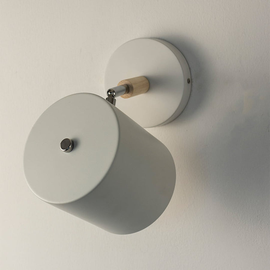 Modern white metal spotlight wall light with minimalist matte finish for stylish interior lighting decor.