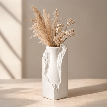White ceramic flower vase with dried flowers modern decorative vase for living room console table home decor styling.