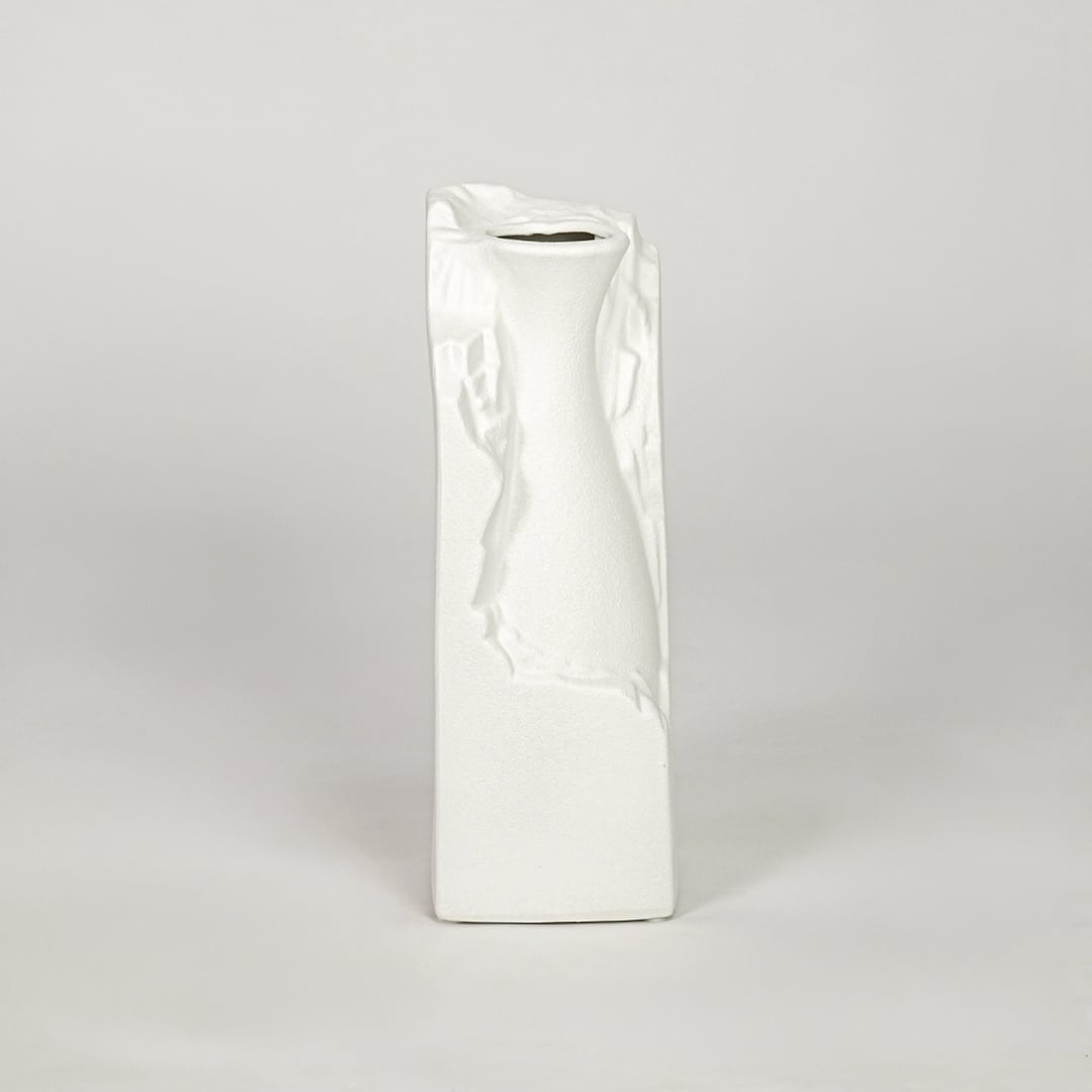 White ceramic flower vase with textured finish modern decorative vase for tabletop shelf console decor styling.