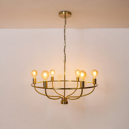 Gold metal candle chandelier with illuminated bulbs creating elegant ambient lighting for sophisticated modern interiors.